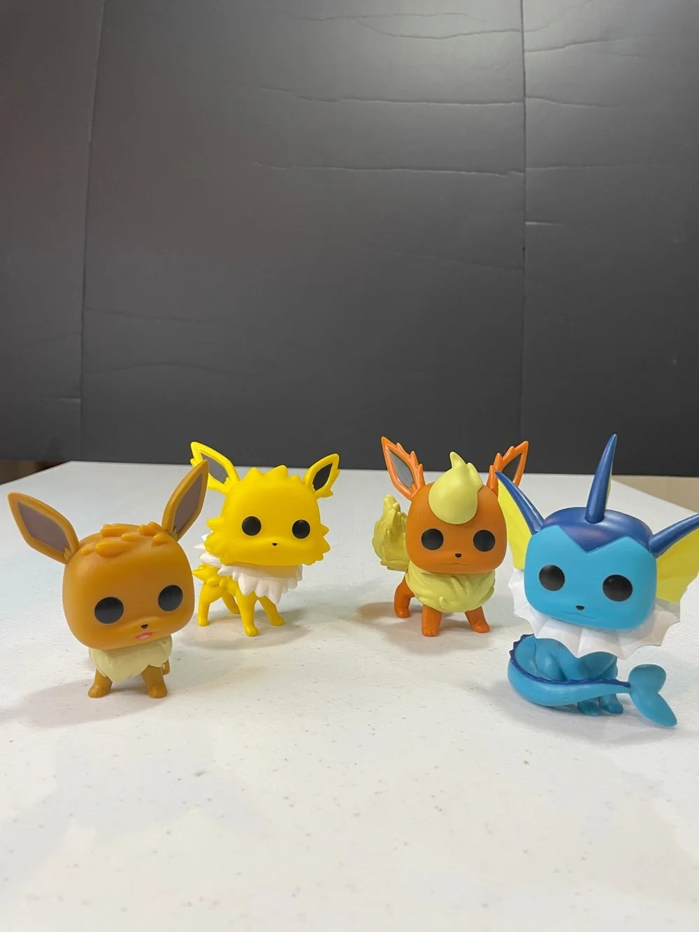 Eevee Evolution Funko-style Vinyl Figure Set (Eevee, Jolteon, Flareon, Vaporeon)